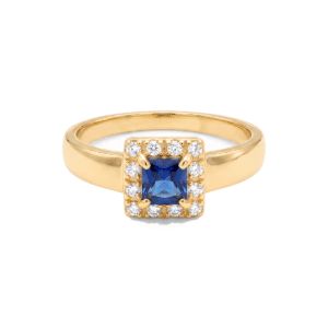 Anel Dourado com Quadrado Central Azul e Borda de Zircônias